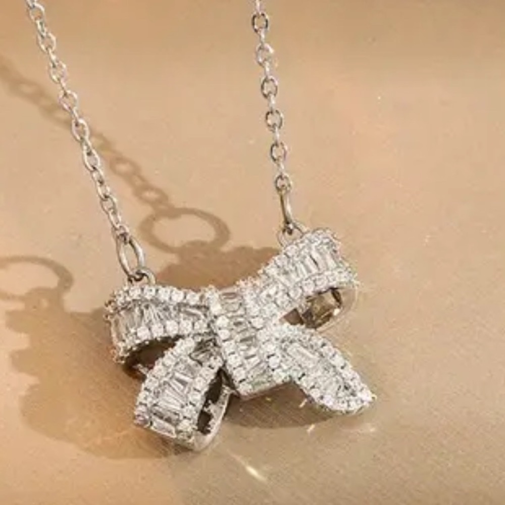 Silver Bow Pendant Necklace
